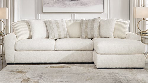 Signature Design by Ashley Chessington 2-Piece Sectional with Chaise - Ivory